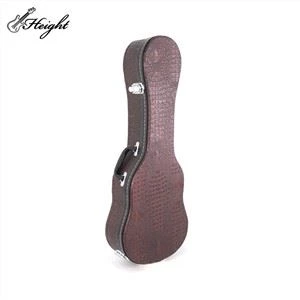Ukulelefodral i falskt ormskinnsplywood